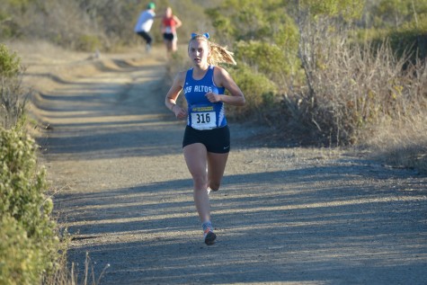 Senior Lauren Jacob runs toward the finish line. She brought home her third straight CCS championship in November. Photo courtesy Jeff Adams.