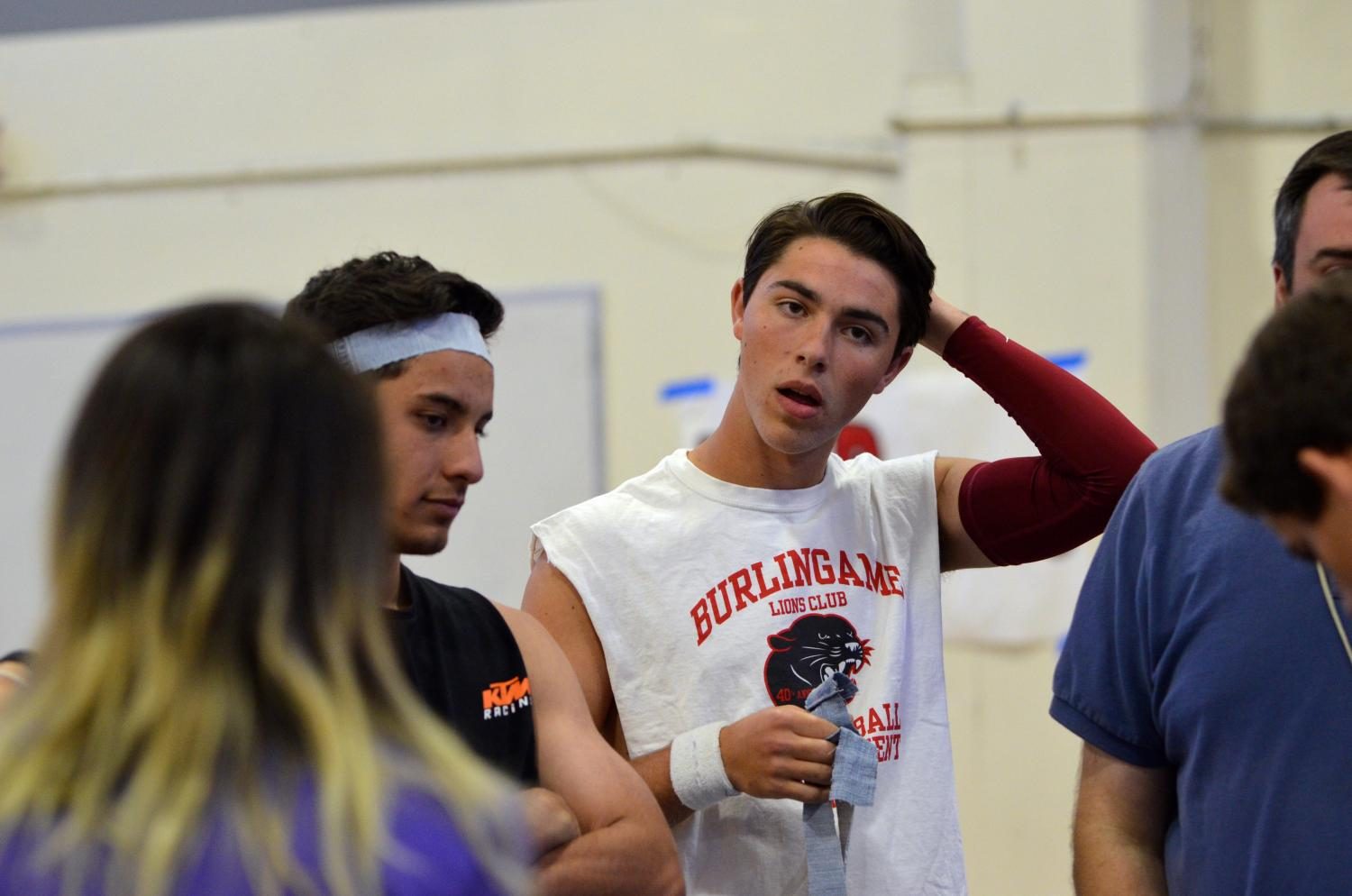 Baby Got Backhand’s senior Adam Rosenbaum adjusts his headband as he prepares for his game against the Globo Purple Gym Cobras in quarterfinals.