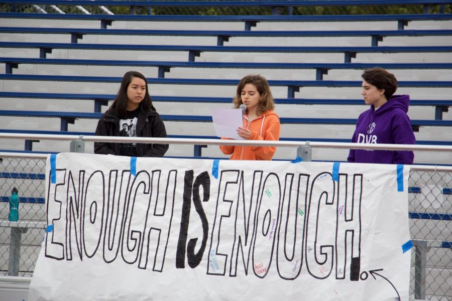 Organizer junior Brynna Mitchner (center) urges students to call on Congress to take action on gun control in the wake of Parkland. Students who walked out last Wednesday were given unexcused absences, but Los Altos could've issued harsher consequences on the basis of the walkout disrupting school activities. Katrina Arsky.