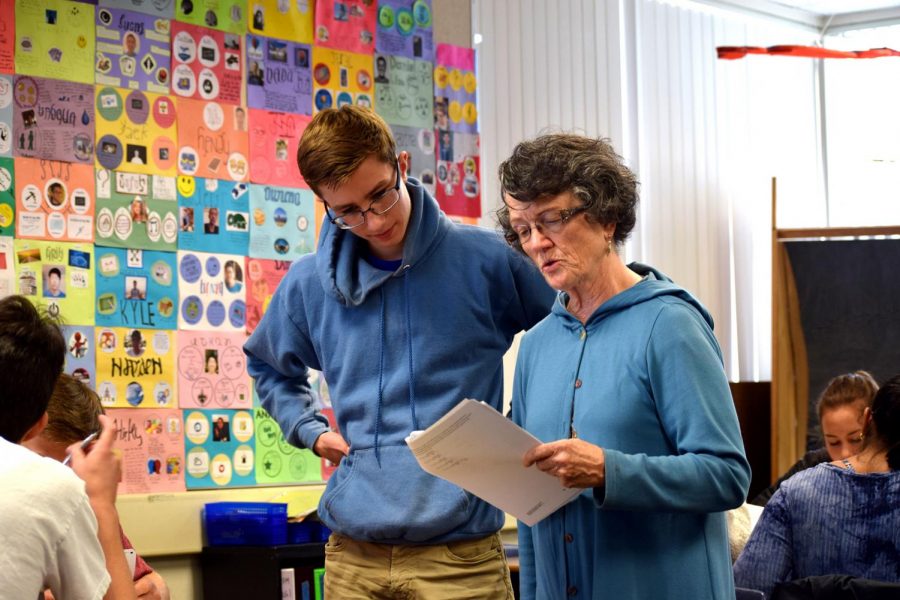 Math teacher Carol Evans helps senior Yann Sartori with test corrections. Known for her sharp wit and tough love, Evans worked to instill a love of learning in her students by prioritizing process over product. Francesca Fallow.
