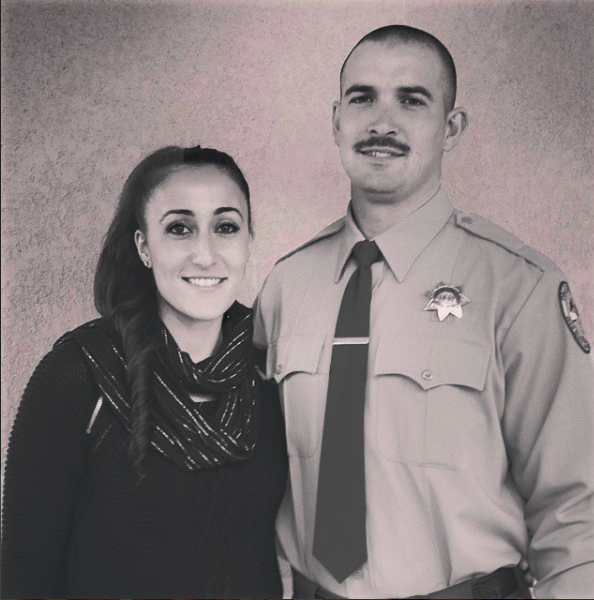 Robbie Parry is a volunteer firefighter for La Honda Brigade. He stands beside his wife Tamar Petrosian.