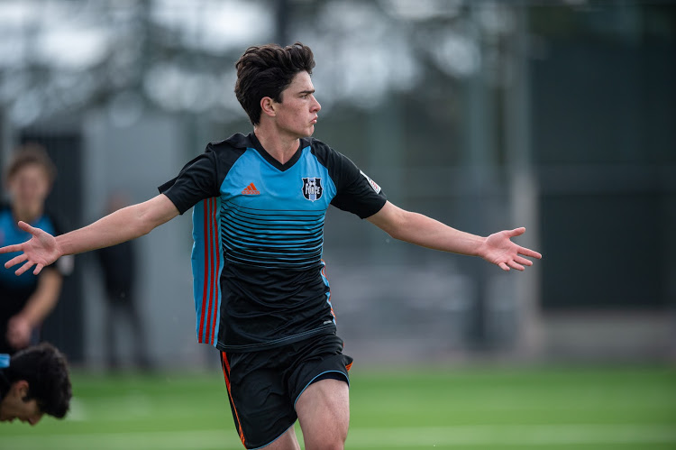 Junior James Wangsness celebrates his game winning goal against
divisional rival Vancouver Whitecaps. James has committed to the
admissions process at Princeton University and plans to play for their
Division 1 soccer team.