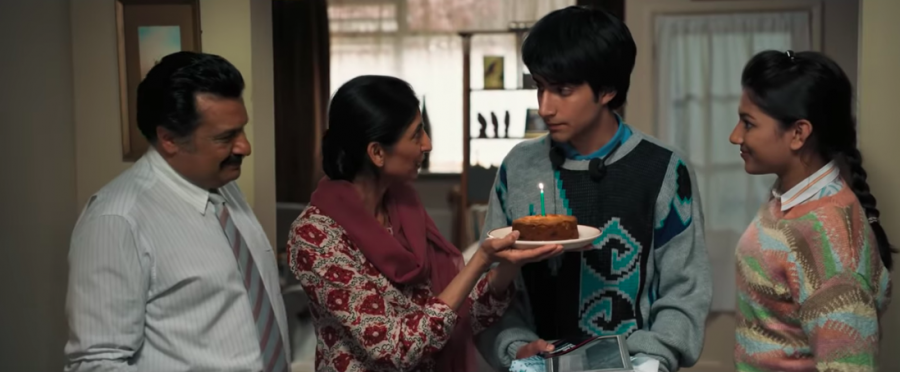 Javed celebrates his birthday with his parents and sister, complete with a homemade cake and his ever-present headphones and cassette of Bruce Springsteen.