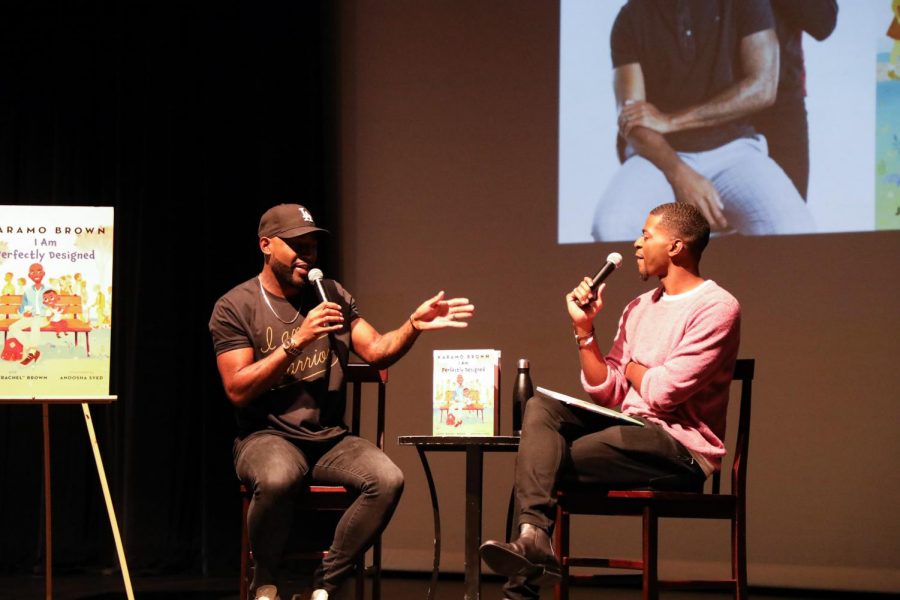 Karamo Brown (left) and Jason “Rachel” Brown (right) talk to an audience in the Eagle Theater about their new picture book, “I Am Perfectly Designed.” The father-son duo pulled from their own experiences and relationship to write a heartwarming story with an important message about self-confidence.