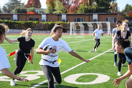 Sophomore Kaia Flores runs the ball down the field in a game the sophomores did not deserve to be in. Unfortunately, we do not have any pictures of the sophomore versus senior game because the photographers were too stunned by the incompetence of the sophomores.