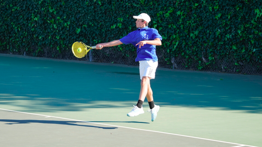 Freshman Matteo Antonescu plays singles one during the varsity boys tennis match against Mountain View. He hopes to become a professional tennis player with the help of his strong work ethic coupled with his technical strengths.