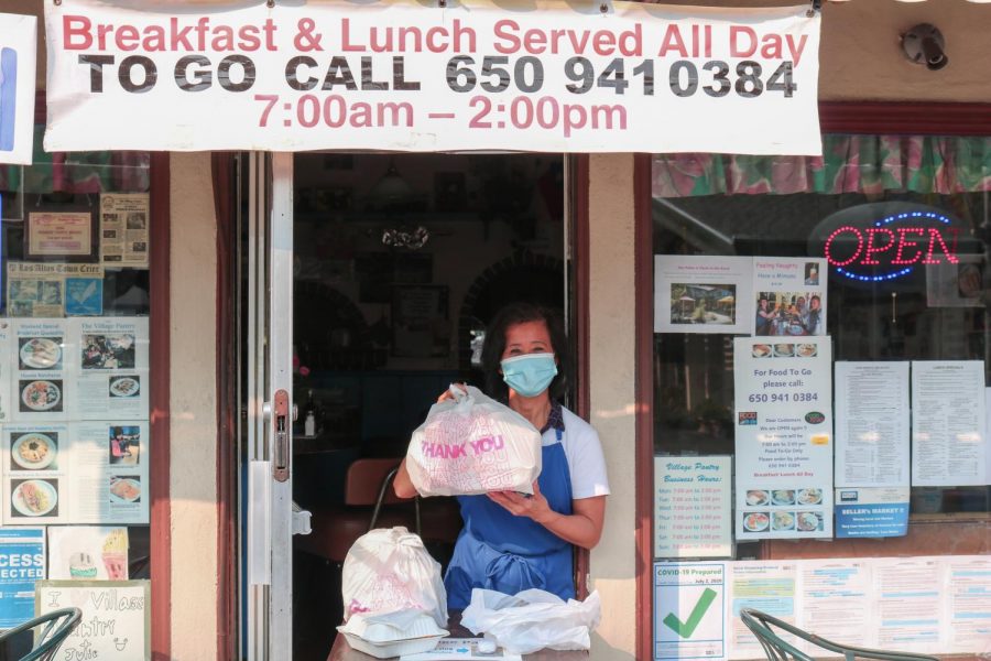 Julie Ogilvie of Village Pantry stands in front of her store. The BAE Initiative, a group of LAHS seniors, has interviewed and discussed with nine Los Altos businesses to understand how they dealing with the pandemic.