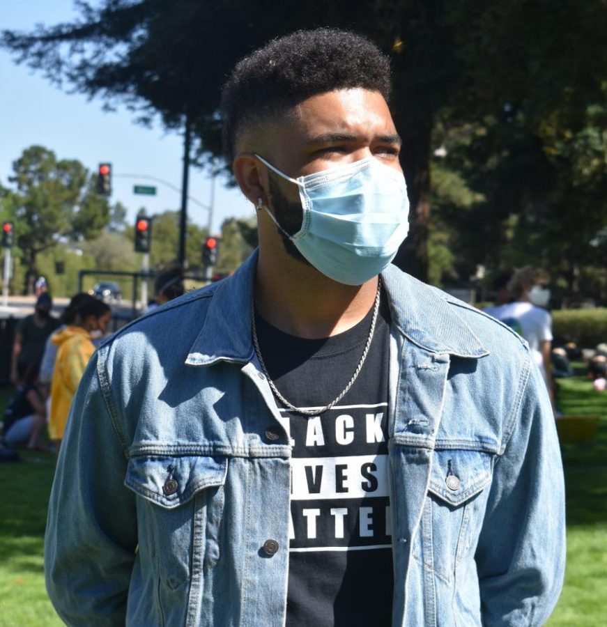 Los Altos High School graduate Kenan Moos, ’16, has battled with racism and discrimination in his community since childhood. As the organizer of the Friday, June 5 Los Altos Black Lives Matter protest, a leader in multiple activist organizations and an independent musician, Moos uses his voice to amplify those of fellow people of color, hoping that one day, they will all live like kings and queens.”