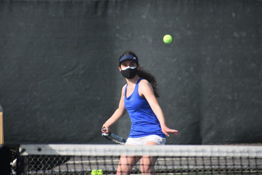 Senior+Maya+Atassi+prepares+to+volley+an+incoming+serve+from+her+opponent.+The+team+beat+Fremont+6%E2%80%931+and+secured+an+undefeated+record.