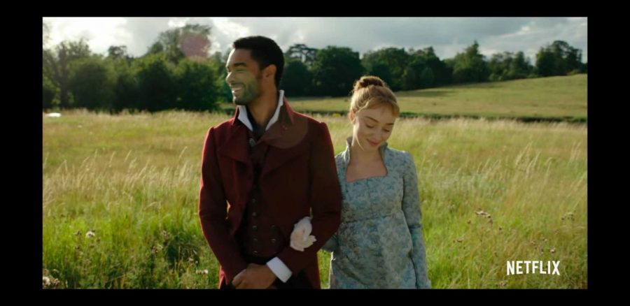 Daphne and the Duke walk through a meadow in the Netflix show Bridgerton. The TikTok musical, inspired by the show, is a viral phenomenon uniquely owed to TikToks increasing influence on the music industry.