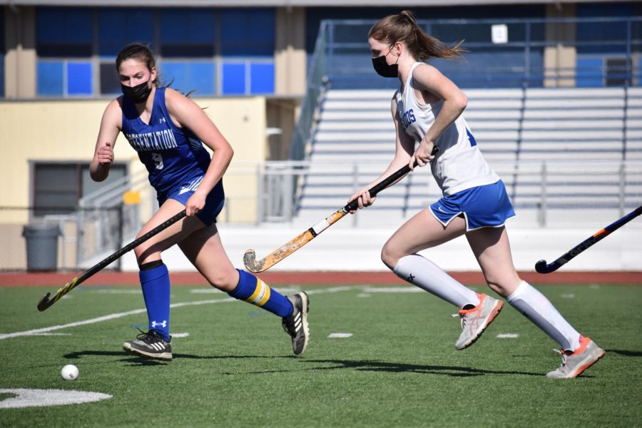 Senior Maura Kelleher chases after the ball alongside a Presentation player. The Eagles beat the Panthers in a 2–0 shutout at their last home game of the season, marking the team's 11 seniors' last game ever on LAHS turf.