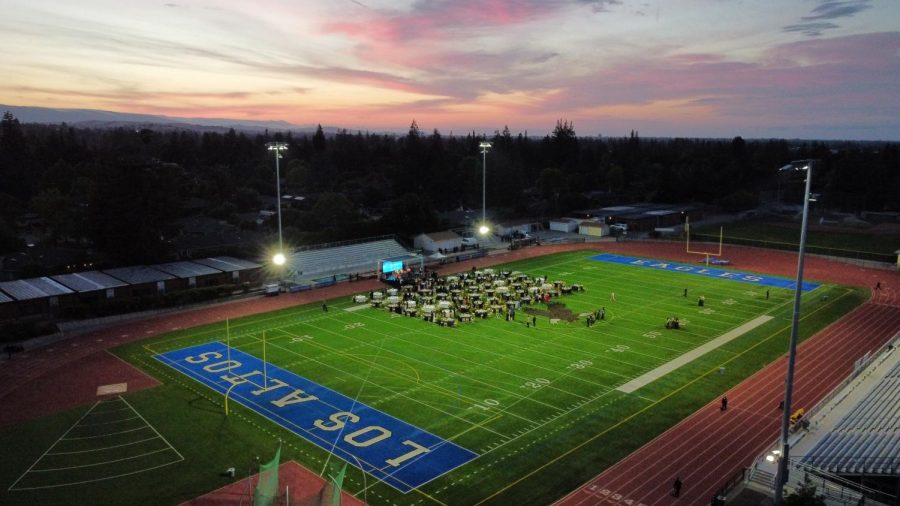 Students attend Seniors Under the Stars, held on the football field. 