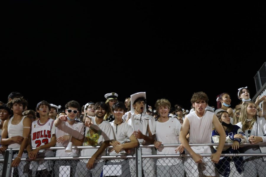 Students cheer in the stands during the homecoming game against Lynbrook High School. 