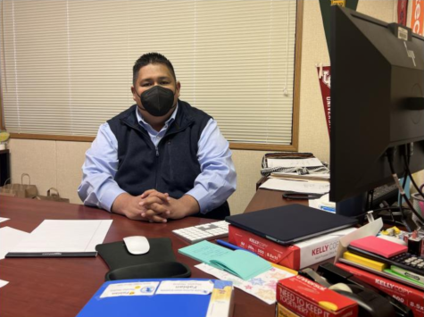 Assistant Principal Fabian Medina-Morales sits at his office desk. New to LAHS, Morales has brought his background in counseling to his new role as an administrator, earning the friendship of colleagues and students alike.