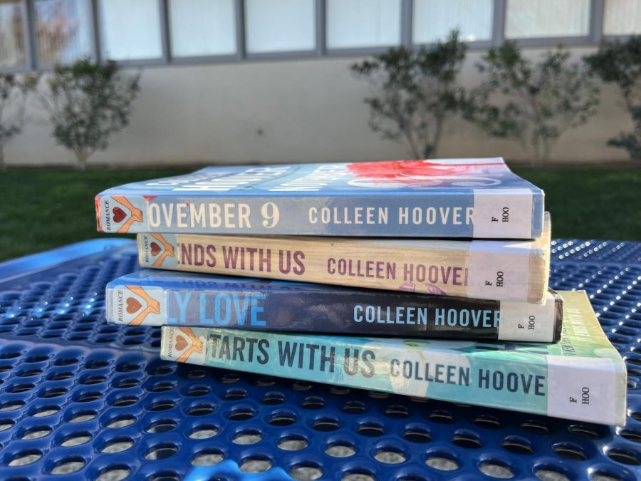 This photo shows a couple books written by Colleen Hoover. Her romance books rose to popularity, however, the love stories romanticizes misogynistic themes and toxic behavior. 
