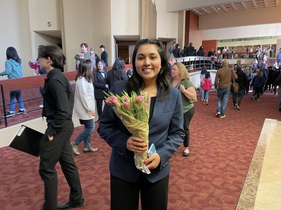 Isha smiles for the camera after performing at the three day All State Honor Choir concert, a state-wide audition-only music program.