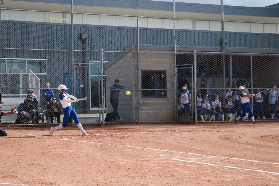 Senior Kelly Zoglin makes a hit during the third inning. 