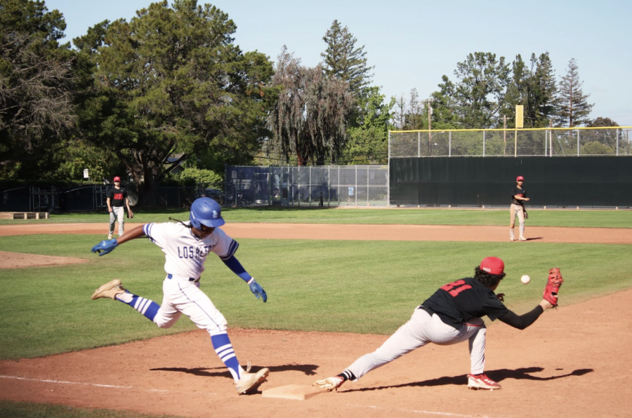 Sophomore Darrion Wesley sprints to first base in the team’s 9–8 loss against Gunn High School. The Eagles will look to reverse their losing streak this Saturday when they play their first playoff matchup against Saint Francis Salesian College Preparatory. 
