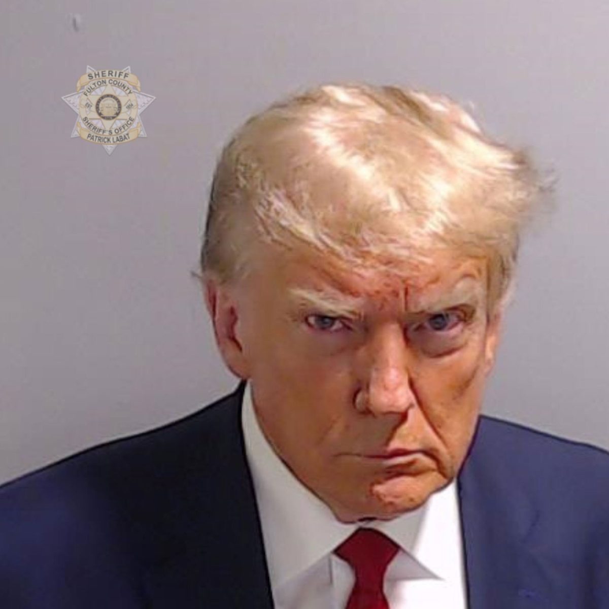 Donald J. Trumps mugshot taken on Thursday, August 24, after he surrendered to the authorities at Fulton County Jail. 