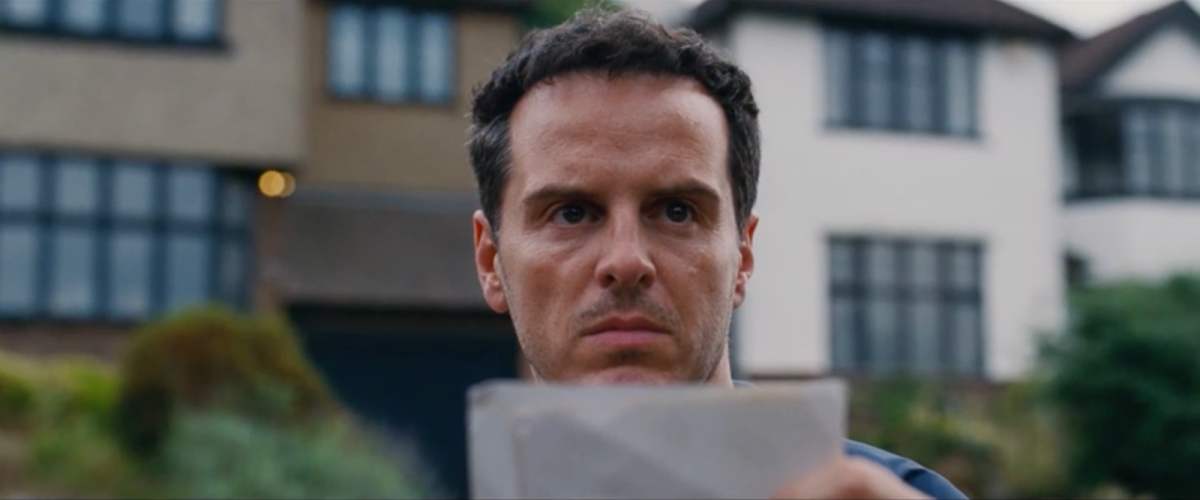  Adam, played by Andrew Scott, compares an old photo of his childhood house to its standing version 30 years later. There, he meets the ghosts of his parents, and they end up working past his childhood trauma together.