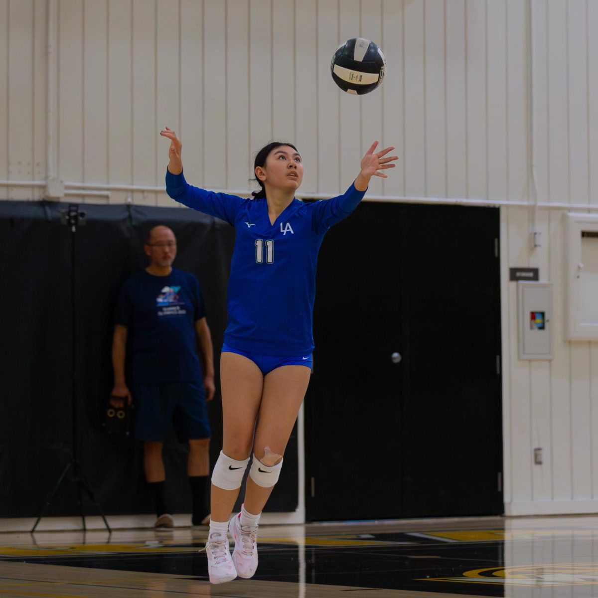 Junior Anastasia Marinopoulos serves the ball. The Los Altos varsity girls volleyball team had a league record of 2-9. 