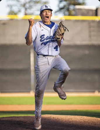 Senior Kai MacQuiddy celebrates his first league win on the varsity boys baseball team. Kai recently announced his commitment to continue his baseball journey at Amherst University.