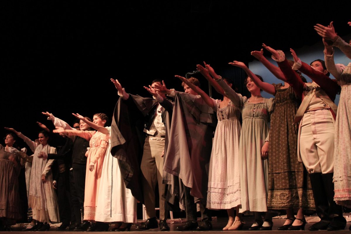 The cast of Pride and Prejudice greets the audience for a final bow.