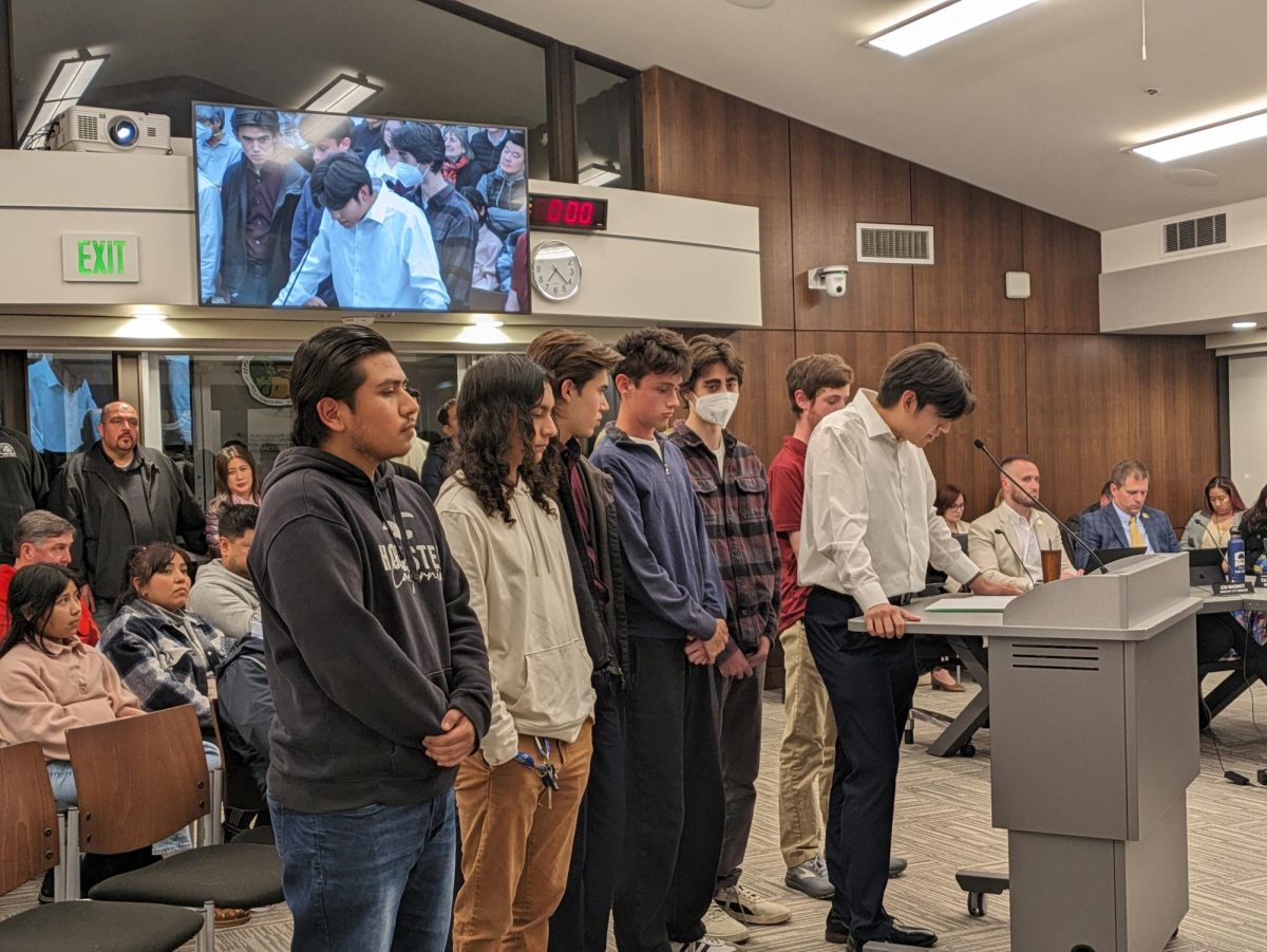 LAHS students speak during public comment at Los Altos city council meeting, protesting new parking restrictions.