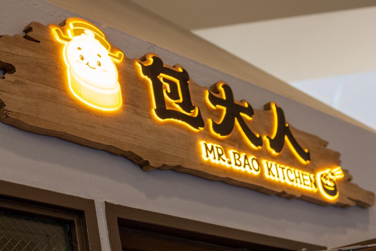 The illuminated sign in front of Mr. Bao Kitchen showcases a cartoon Bao mascot, advertising freshly steamed bao to passers-by. Mr. Bao Kitchen officially opened on Castro Street, Mountain View in late March.
