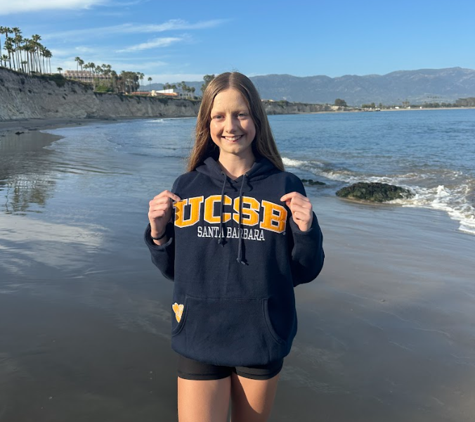 Senior Axelle Allanic poses in her UCSB sweatshirt. In May, she committed to its D1 cross country program. 