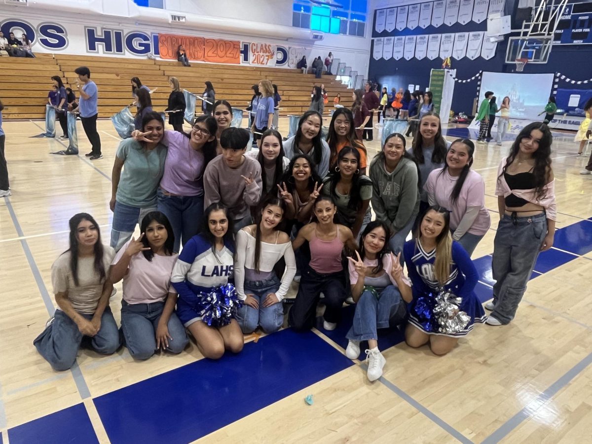 The Hip Hop Dance Club poses together after the 2024 Homecoming Rally. Every year since its formation, the club has provided a space at LAHS for students to perform and practice hip hop.