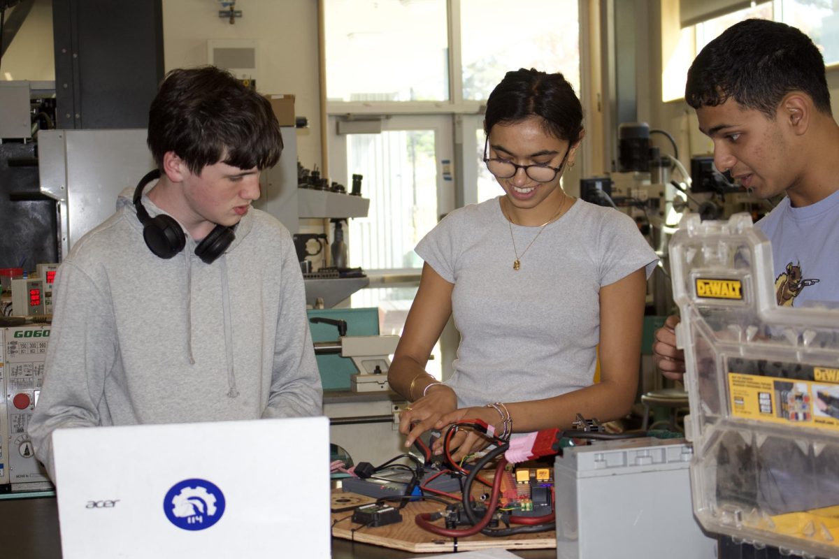 Sophomore Diya Gupta works on the test board in Robotics 2. As one of the new members in the class, she is learning how the class operates. 