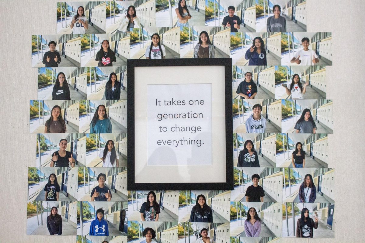 Students in AVID seek to be the first in their family's to reach higher education. Their portraits surround a motivational quote on AVID teacher Jonathan Kwan’s wall.