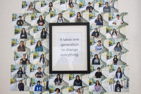 Students in AVID seek to be the first in their family's to reach higher education. Their portraits surround a motivational quote on AVID teacher Jonathan Kwan’s wall.