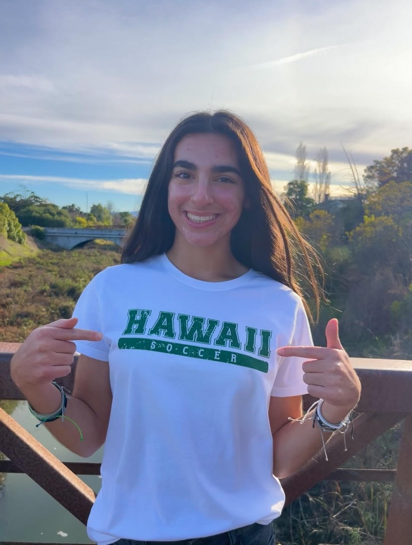 Senior Parisa Abedi poses in a University of Hawaii Mānoa soccer T-shirt after announcing her commitment to the Division I school.