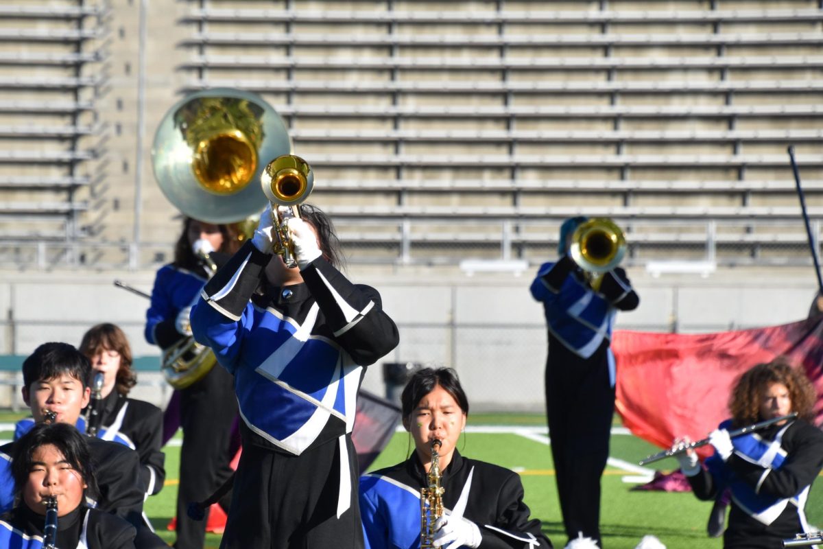 Marching band and Color Guard students perform at the Western Band Association (WBA) California Class Championships. The team wrapped up its season on Nov. 22, concluding a successful integration of new marchers into the program.