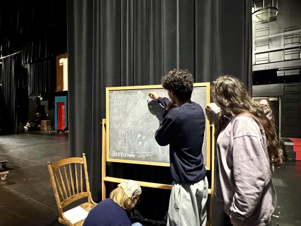Fifth period Acting I students prepare for their show, “Slice of Life,” on Tuesday, March 10. “Slice of Life” and fourth period’s “The Descent” feature five stage scripts from Creative Writing students.
