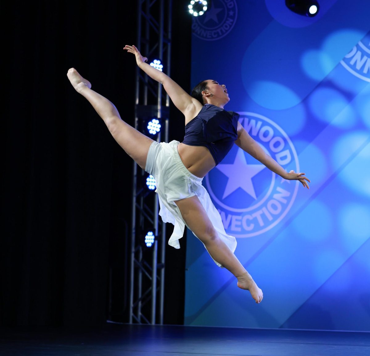 Noel performs a lyrical solo at a competition. She is recognized for her performances at LAHS rallies, where she transforms the gym floor into a dance floor.